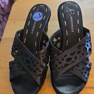 B. Makowsky Black Mules with Perforated Design